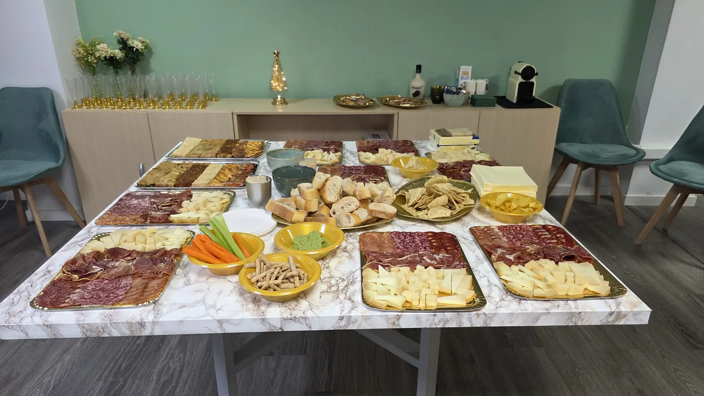 Team celebration spread at the Dream Nest office